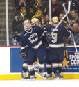 The Irish celebrate the empty-net goal that made it 6-3 (photo: Candace Horgan).