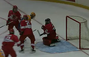 Plattsburgh's Bryan Hince makes a save.