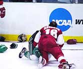 Michigan State and Wisconsin played a physical game, punctuated by this first-period scrum (photos by Christopher Brian Dudek).