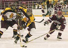 Minnesota-Duluth overpowered Harvard in the third period for a berth in the title game (photos by Jason Waldowski).