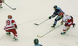 BU defenseman Freddy Meyer goes down to block a shot from Maine's Niko Dimitrakos. (photos by Scott Weighart)