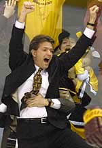 Don Lucia celebrates the Gophers' first national title since 1979 (photo: Pedro Cancel)