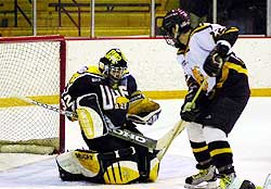 Netminder Lance Mayes makes a stop against FSU (photo: Christopher Brian Dudek)