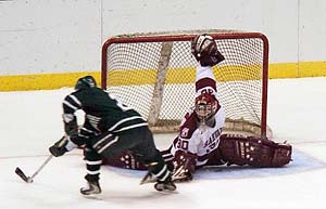 Mike Murray scores on a penalty shot for Dartmouth. (photos: eLynah.com)