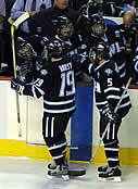 Tim Horst is congratulated after scoring UNH's first goal.