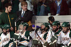 George Roll behind the Oswego bench during Saturday's D-III championship. (Photo: Ed Trefzger)