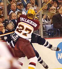 Barry Tallackson -- all 6-4, 211 pounds of him -- goes hard into a UNH defender during the 2003 NCAA title game (photo: Talya Arbisser).