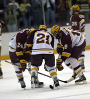 Matt Koalska (24), Grant Potulny (18), Troy Riddle (21) and the Gophers will return to the Frozen Four (photo: Jason Waldowski).