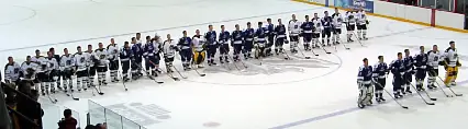 Both teams show their respect for one another after the game.