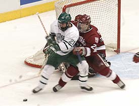 Harvard defenseman Dave McCulloch scored and did a good job clearing the front of his net.
