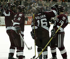 Harvard celebrates the sweep. (photo: Timothy M. McDonald)