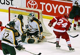 Miami's Todd Grant scores in the RedHawks' win. (photo: Christopher Brian Dudek)