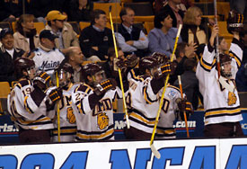The UMD bench celebrates a quick 2-0 lead in the game. (Photos: Tim McDonald)