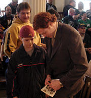 Lessard signs autographs after the presentation (photo: Kelly McGinnis).