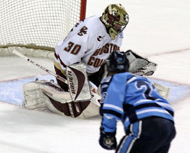 Jon Jankus shoots on Matti Kaltiainen for the Maine goal (Photo:  Pedro Cancel)