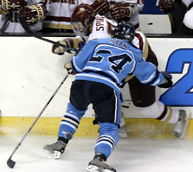 Prestin Ryan pins BC's Dave Spina against the boards Thursday (photo: Pedro Cancel).