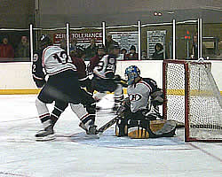 Hobart's Dmitri Papaevagelou makes a stop against Potsdam, which was on its way to a 4-2 lead.