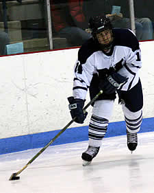 Middlebury senior Patrick Nugent faces a quarterfinal challenge from Hamilton.