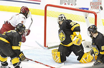 Gabe Gauthier scores his first of two goals for Denver. (photo: Pedro Cancel)