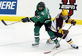 Erik Fabian (l., with Judd Stevens) scored two goals to give UND an unexpected lift in the national semifinals (photo: Pedro Cancel).