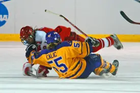 Archrivals Plattsburgh and Elmira played one of their typical physical games. (Photos: Angelo Lisuzzo)