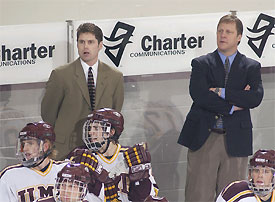 UMD head coach Scott Sandelin (right, with assistant coach Steve Rohlik) could preside over the WCHA's darkhorse team this season.