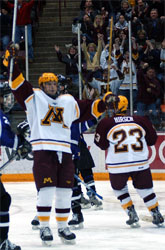 Danny Irmen (l.) scored twice as the Gophers pulled away Friday (photo: Jason Waldowski).