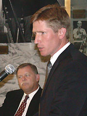 North Dakota athletic director Roger Thomas looks on as new coach Dave Hakstol speaks at a news conference Friday. (photo: Patrick C. Miller)