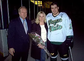 Lone WSU senior John Grubb, who was honored on Senior Day, with fiancee Nicole Campbell and head coach Bill Wilkinson (photo: Matt Mackinder).