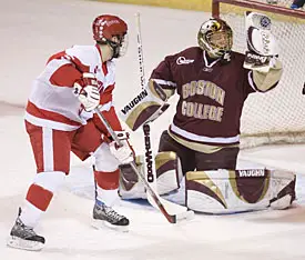 Regional MOP Cory Schneider eyes the puck -- in his glove -- off a John Laliberte shot.