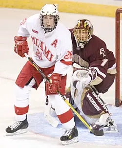 Ryan Jones parks in front of BC netminder Cory Schneider.