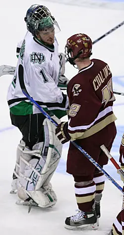 Chris Collins shakes hands with Jordan Parise after Thursday's semifinal. (photo: Melissa Wade)