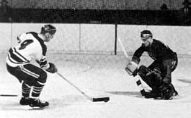 The Crimson's Bill Cleary goes in on net in the Beanpot back in the '50s (photo: Harvard athletic communications).