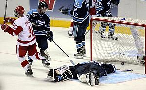 Jack Skille (l.) celebrates Ben Street's third-period goal as Maine netminder Ben Bishop lays out (photo: Melissa Wade).