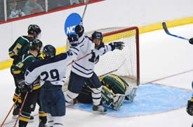 John Sales (29) scores just after a power play ends to give Middlebury a 2-0 lead. (photos: Angelo Lisuzzo)