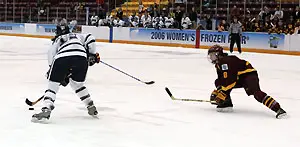 Bobbi Ross defends a UNH player. (Photo: Ryan Coleman)