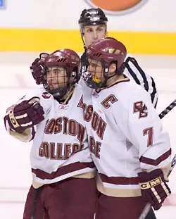 Stephen Gionta (l.) and Peter Harrold celebrate Gionta's goal.