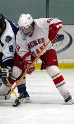 Last season's AHA Rookie of the Year, Bear Trapp, will help key Sacred Heart this year.