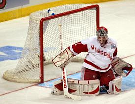 Brian Elliott (with puck) stopped 32 shots to backbone Wisconsin into the NCAA title game (photo: Skip Strandberg).