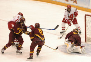 Jinelle Zaugg (L) scores the Badgers' first NCAA final goal on a feed from fellow Wisconsin native Cyndy Kenyon (R). (Photo: John E. Van Barriger / <a href='http://words-photos.com'>words-photos.com</a>)” /></p>
<div class=