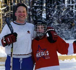 Best buds. Taking a break while playing at Uncle Ray's outdoor rink.