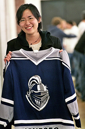 Hiroko Yuki with the jersey presented to her by the Geneseo Ice Knights. (photo: V.W. Hope)