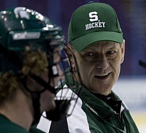 Michigan State head coach Rick Comley talks to forward Bryan Lerg at the Frozen Four (photo: Melissa Wade).