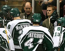 Michigan State head coach Rick Comley addresses the Spartans (photo: Melissa Wade).