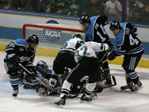 Nick Sucharski (22) scores the game winning goal for Michigan State in the third  period (photo: Skip Strandberg).