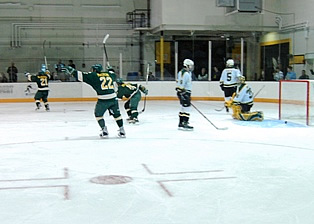 Oswego celebrates one of its three regulation goals.