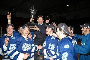 The Chargers carry head coach Doug Ross off the ice after their CHA tournament win Sunday (photos: Doug Eagan).