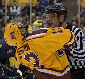 Gopher Ben Gordon and linesman Brad Shepherd interact Saturday (photo: Melissa Wade).