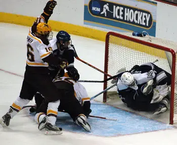 Minnesota's Mike Carman celebrates his game-winning goal (photo: Skip Strandberg).