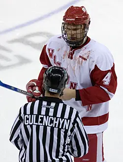 Davis Drewiske (seen here after a scrum in last season's WCHA Final Five) will captain the 2007-08 edition of the Badgers (photo: Melissa Wade).